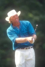 Australian golfer Greg Norman tees off during the day two Kemper O- Old Photo 1