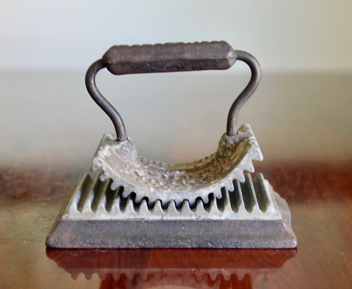 Antique Cast Iron Geneva Hand Fluter 