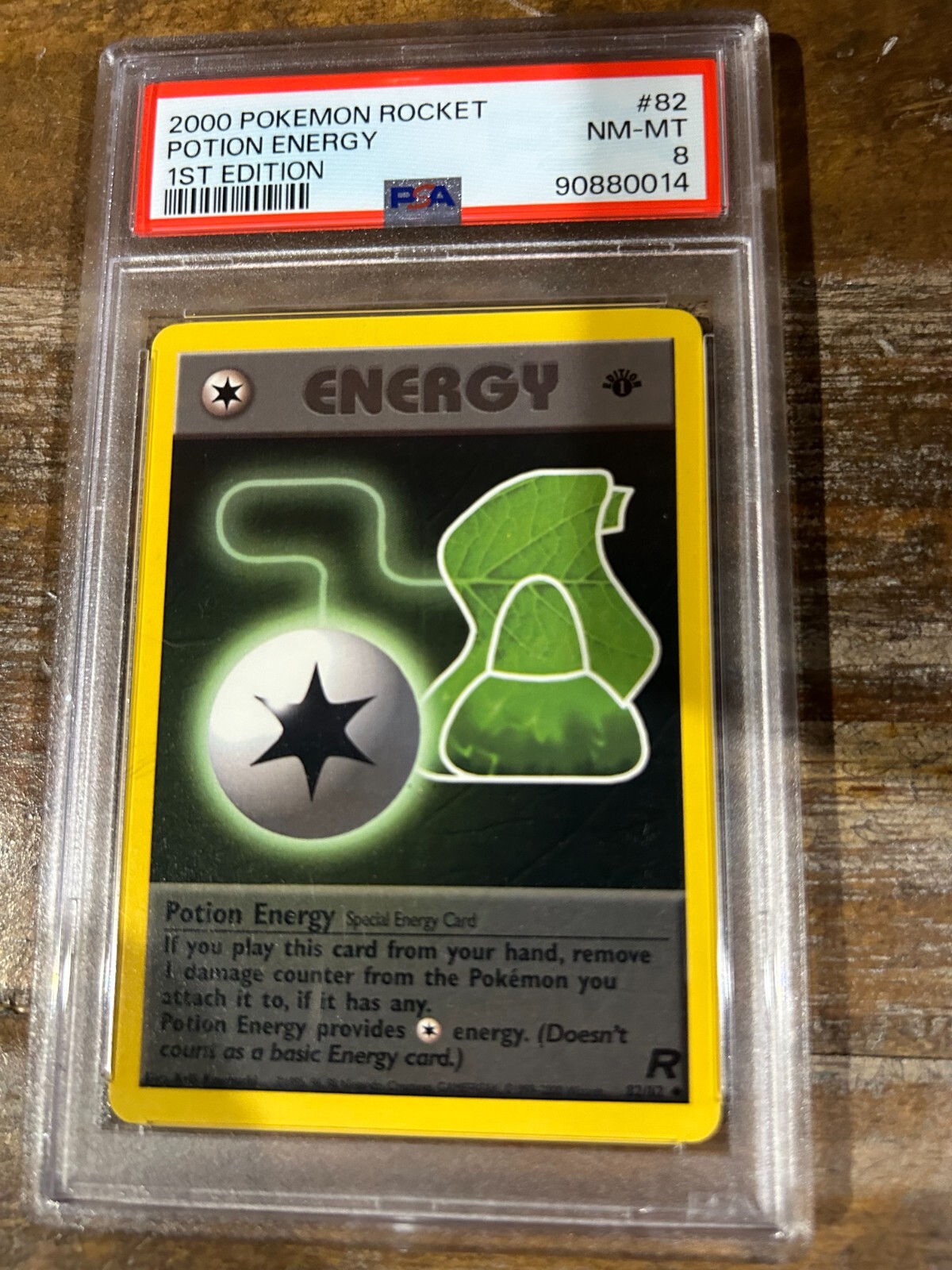 Pokemon 2000 Rocket POTION ENERGY 1ST Edition #82 PSA 8 RARE