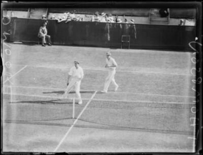 Tennis players B Moore and D Thompson on the court at the NSW Champ- Old Photo
