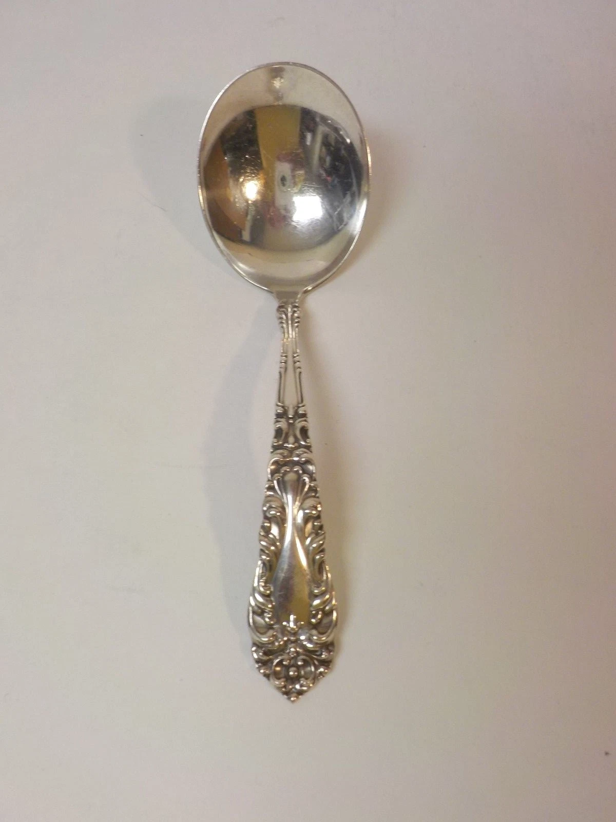 Elaborately Embossed Sterling Silver Sauce Ladle, 35 grams