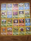 20 Pokémon Cards Including 1st Editions Dark Gyarados And Rare Holo Wheezing