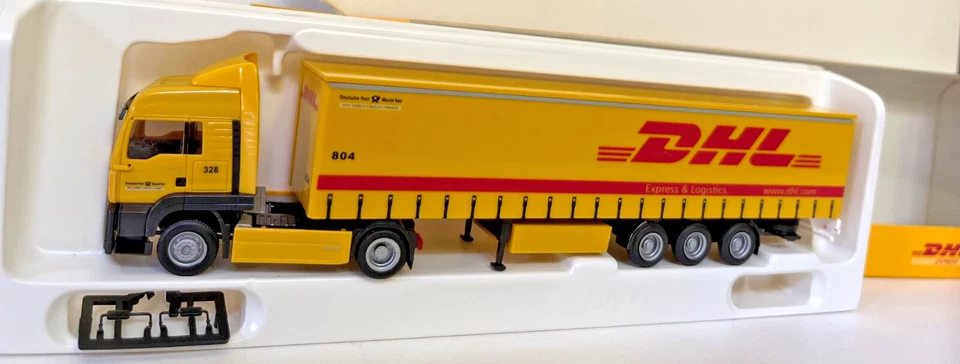 AWM 1:87 MAN TGA LX semi-remorque bâche à rideaux DHL - TOP + EMBALLAGE... - Photo 1/1