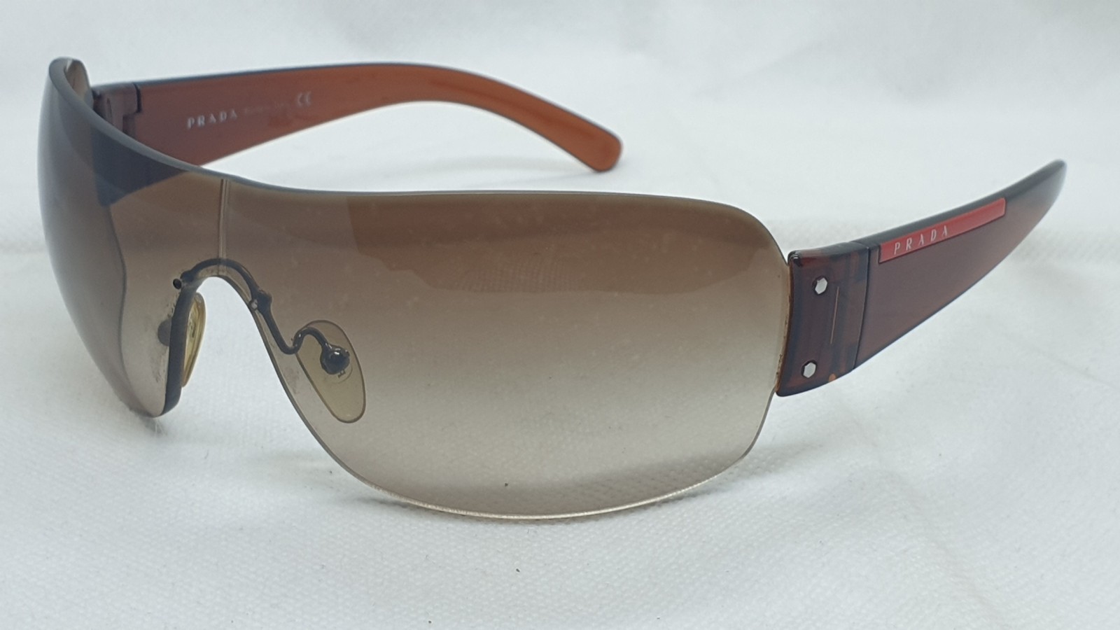 Prada SPS 07F 4AN-6S1 Sunglasses. Brown Color.