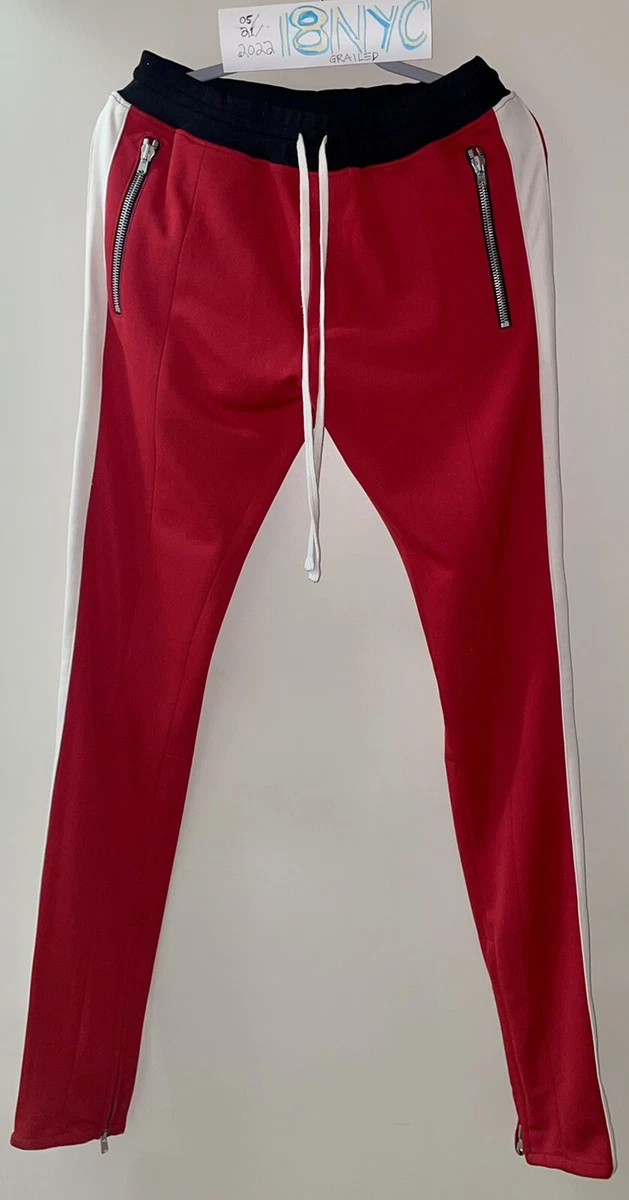 Fear of god striped track pants sales