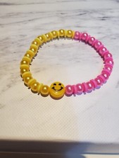 Hand Crafted Smiley Face Bracelet Yellow And Pink