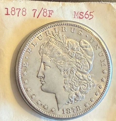 1878 7/8 TF    Morgan Silver Dollar .   UNCIRCULATED!  In Orig. Plastic!  MS65 !