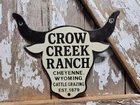 VINTAGE CROW CREEK RANCH PORCELAIN SIGN OLD CATTLE GRAZING COW STEER WYOMING