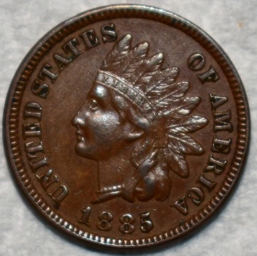 About Uncirculated 1885 Indian Head Cent, Lustrous, Chocolate-Brown specimen.