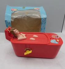 1996 Beauty in the Bath Saving Bank Everlast Toys Red Wind Up Works