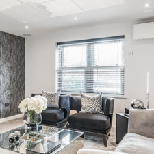 2 x beautiful designer armchairs in immaculate condition. Hardly used!!