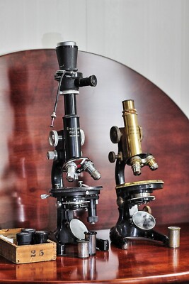 PAIR OF LEITZ MICROSCOPES BRASS TO BLACK AND MICRO-IBSO PHOTO ATTACHMENT '24-'42