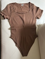 OQQ Brown XL Short Sleeve Stretch Bodysuit for Women One Piece Wireless Solid