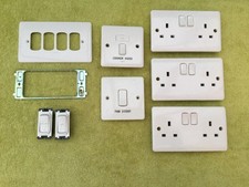 Used Legrand 3xdouble sockets, spur, retractible switch, etc  see description
