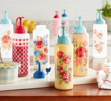 NWT PIONEER WOMAN SQUEEZE CONDIMENT BOTTLE SET OF FOUR