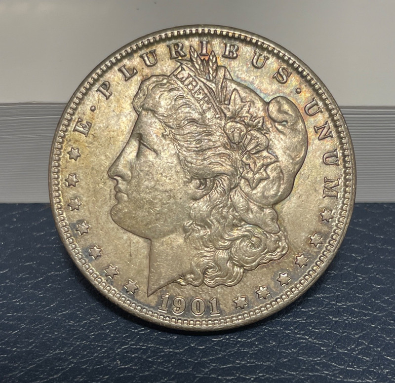 (#100830).  Morgan Dollar: 1901 O  unc  weak strike on feathers     (see video!)