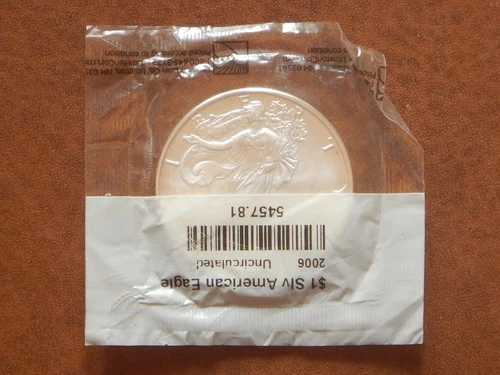 2006 Silver American Eagle UNCIRCULATED & SEALED **Discoloration spots on back**