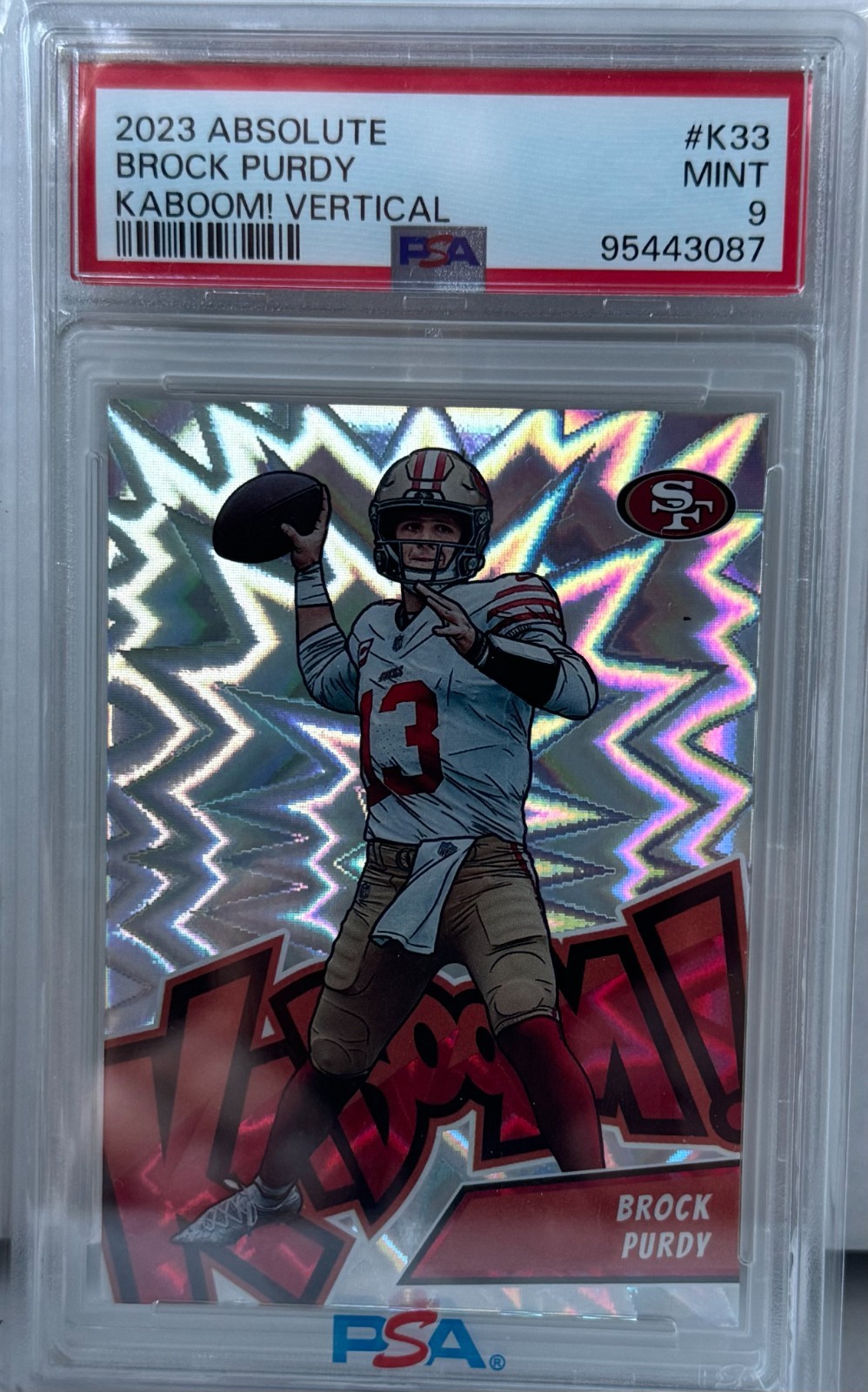 2023 Panini Absolute - Kaboom! Vertical Brock Purdy #K33