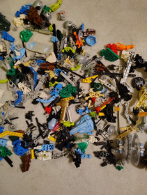 LEGO Bionicle Lot - 2.9 lbs. Miscellaneous Parts and Manuals -8533, 8566, 8570