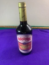 vintage bottle of ANGOSTURA Gredadine Syrup unopened