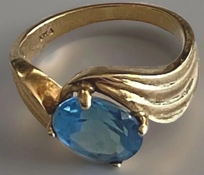 Swiss Blue Topaz Solitaire 10K Gold Ribbon Sculpture Ring (see appraisal)