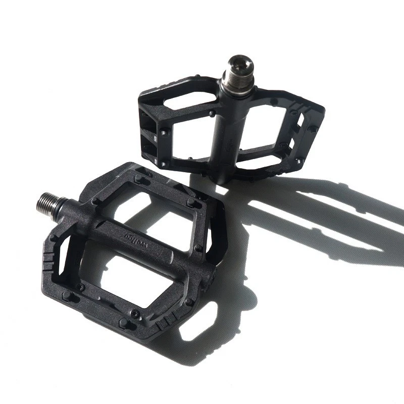 Nuevos pedales de plataforma de fibra de carbono Wellgo 2025 KMX04 husillo de titanio ultraligero Foto 3 de 4