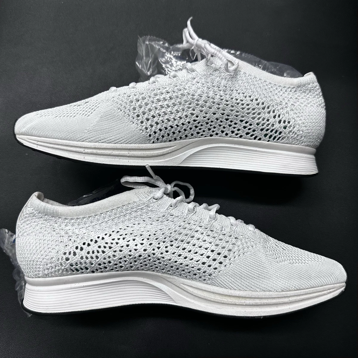 Nike Flyknit Racer Triple White for Sale | Authenticity Guaranteed