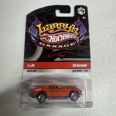Hot Wheels Larry s Garage  63 Corvette Orange Real Riders 7/20 N9051 2009