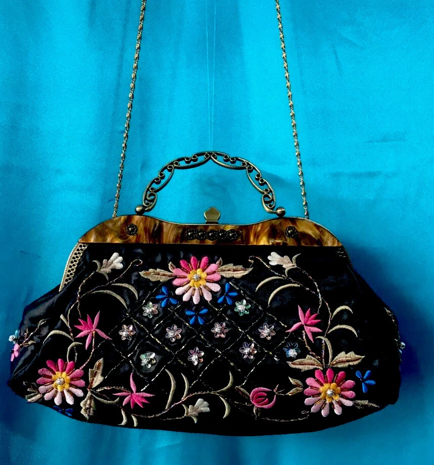 Bolso sin asas con cierre de metal de marca de lujo para mujer con forma de caja y retazos Foto 2 de 4