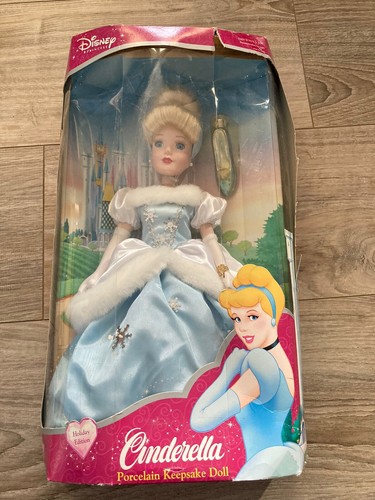 brass key keepsake disney porcelain dolls