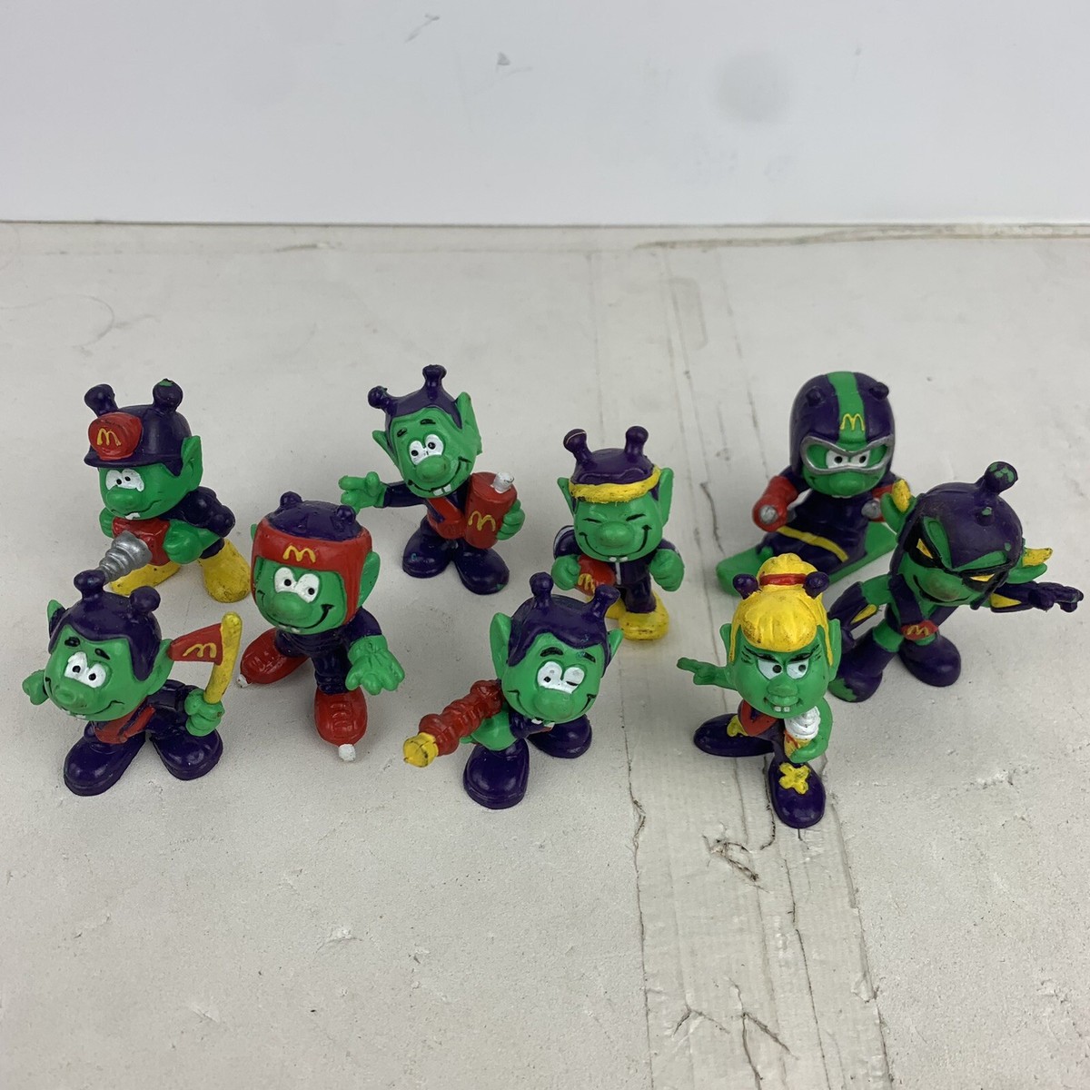 Lot of 9 1980s Mcdonalds Astroniks Various Years Green Alien Ray