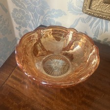 PRETTY CARNIVAL GLASS BOWL WITH RAISED FLOWER DESIGN AROUND THE OUTSIDE