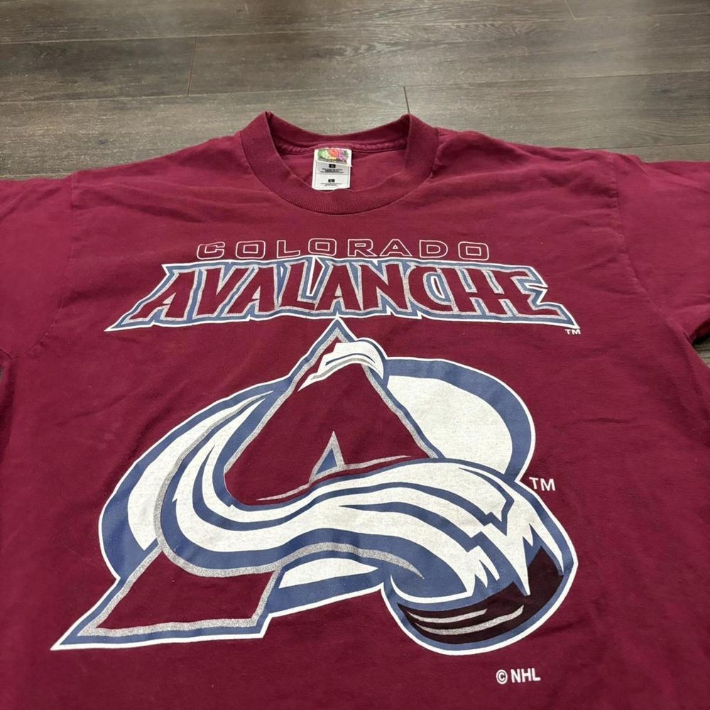 Colorado Avalanche NHL Champions Logo Graphic Unisex T shirt HN5694