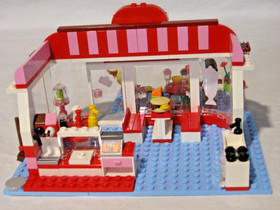 Used Lego Friends Cafe 3061 & Juice Bar 41035, complete with manuals.