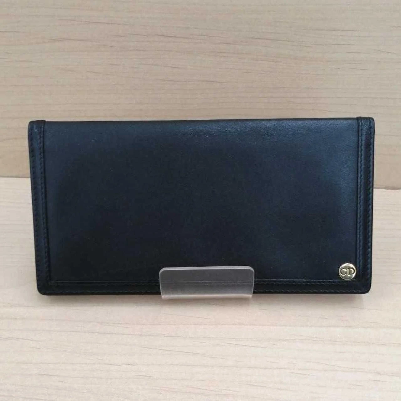Portefeuille porte billets Christian Dior en cuir noir