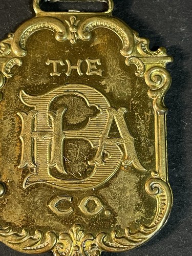 Antiguo reloj Bloomberg’s Clothiers Ohio 1910 décimo aniversario llavero - Imagen 6 de 7