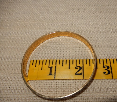 Pair of enamel over gold tone metal J. Crew bangle bracelets in fun patterns - Picture 10 of 12