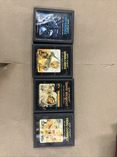 4 Game Lot Asteroids, Super Breakout, Video Olympics, Warlords Atari 2600.