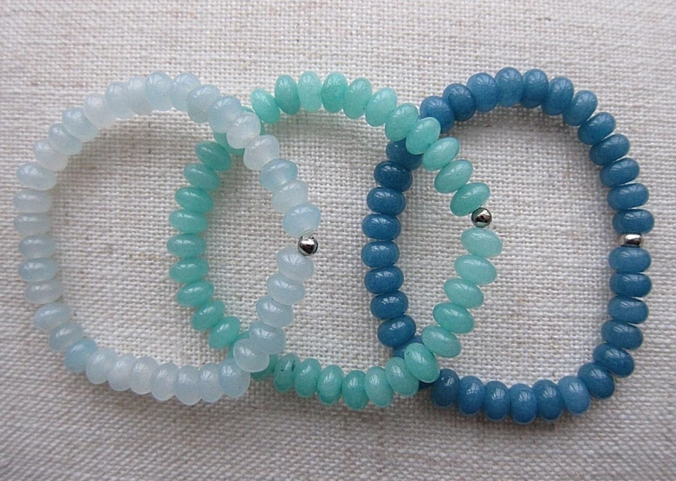 Pulseras de cuentas estilo aguamarina azul con espaciadores de acero inoxidable. Foto 4 de 4