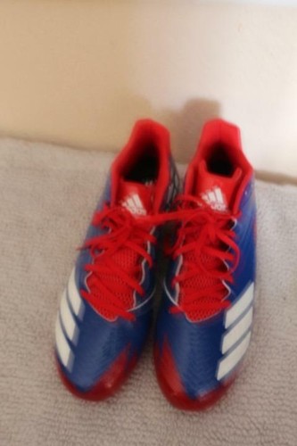 blue and red adidas cleats