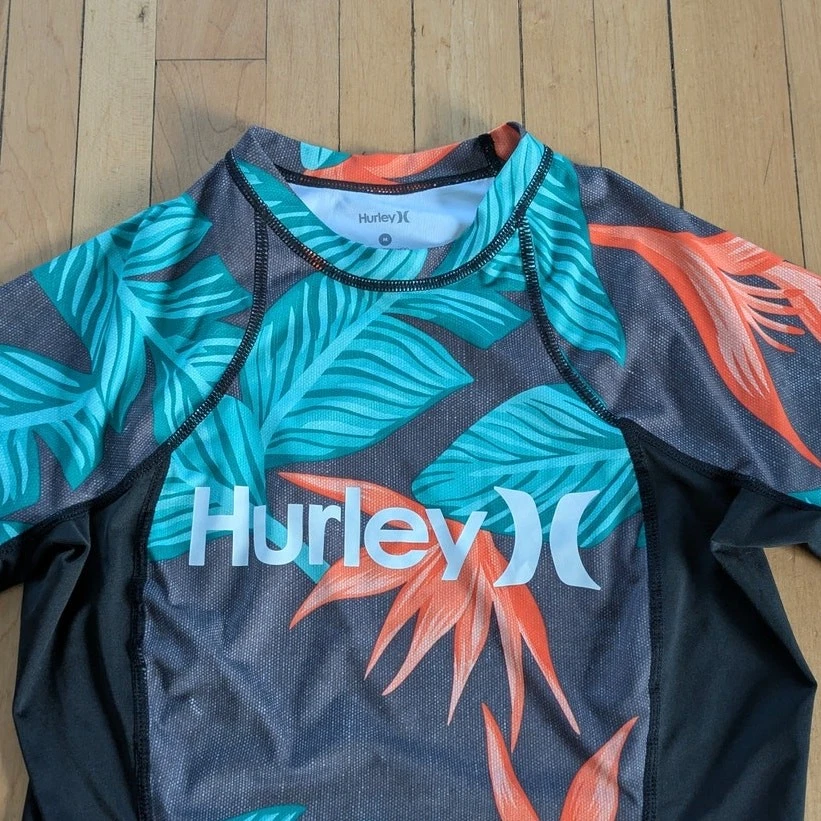 Rashguard Floral Hurley Hanoi Talla M Negro Verde Surf Compresión Hawaiana UPF Foto 2 de 4