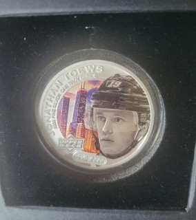 2017 Upper Deck Grandeur Hockey ounce .9999% Troy Silver coin of Jonathan Toews