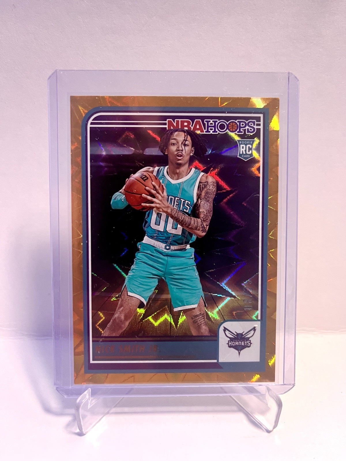 2023-24 Panini Hoops - #235 Nick Smith Jr. - Orange Explosion /25 - Hornets - RC