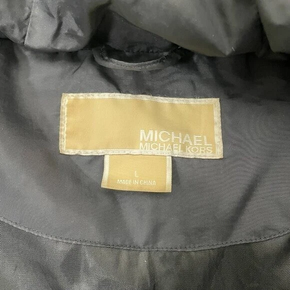 Piumino donna Michael Kors nero imbottito pelliccia sintetica orlo cappuccio taglia L con difetti