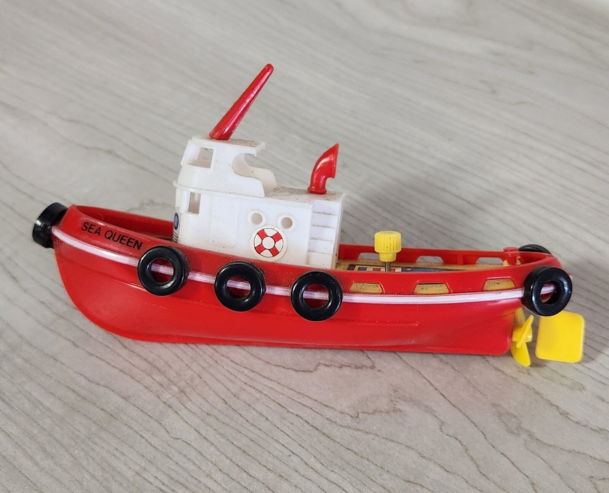 Tugboat : We'll pull you where you want… Tugboat Pulling Industrial Ship Stock Photo - Download Image