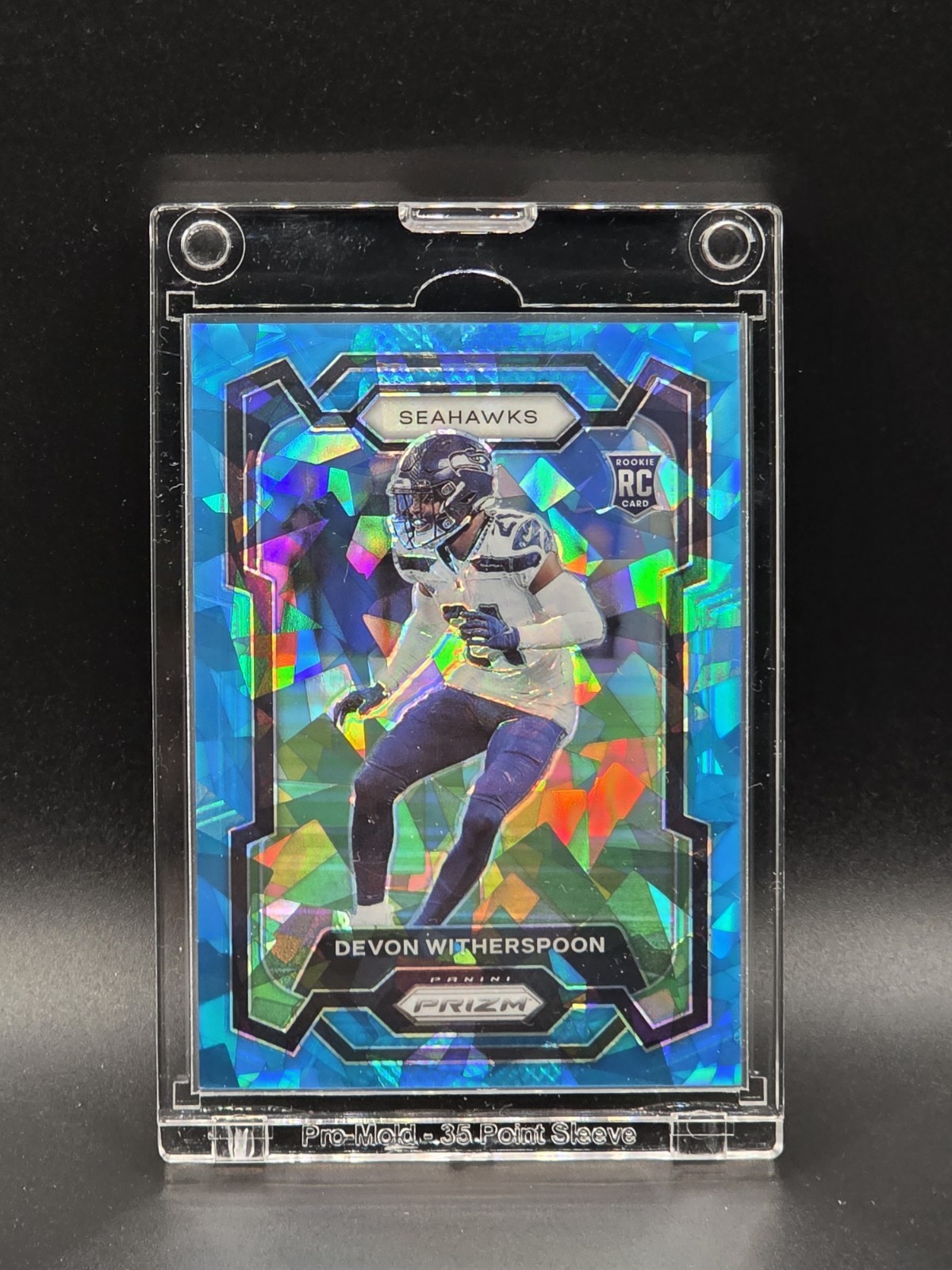 2023 Prizm Rookies Devon Witherspoon RC #389 Blue Cracked Ice /99 Seahawks🔥