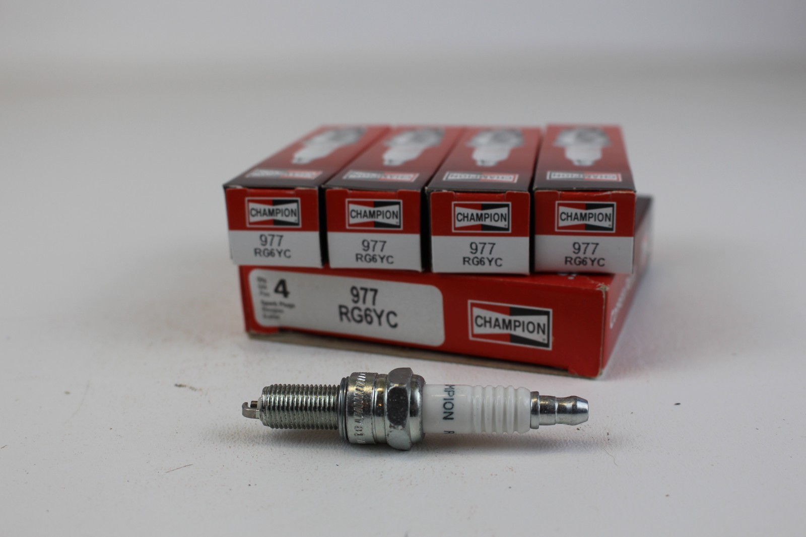 4 pk Champion 977 RG6YC Spark Plugs NOS