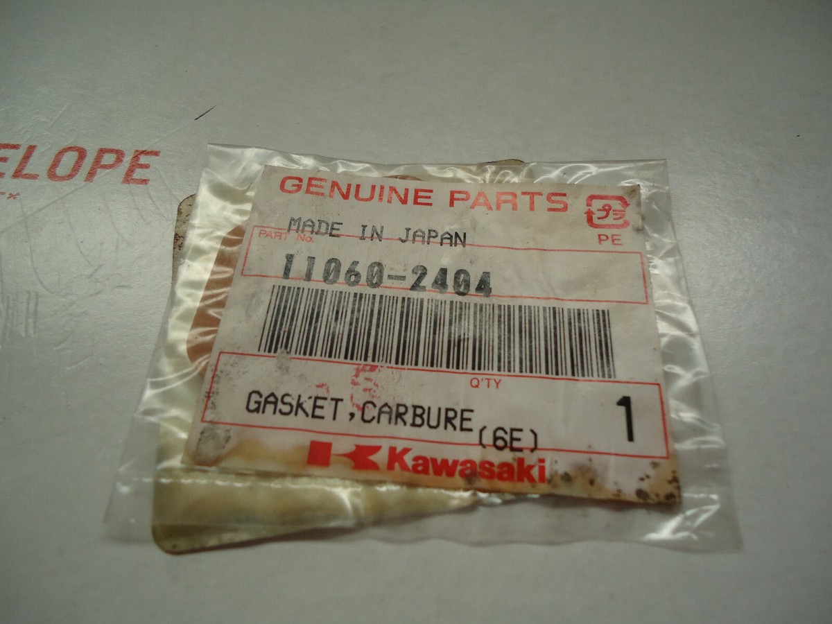 NEW KAWASAKI OEM CARB GASKET PART NUMBER 110602404 FITS: KBL26A
