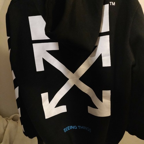 off white sweater seeing things