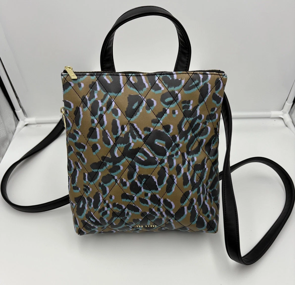 NWT Ted Baker WX- Quiltoe
Quilted Leopard Black gold teal 
Vinyl
11”x9.5” Ted Baker | Quiltoe quilted leopard backpack | EQVVS Womens main image 3